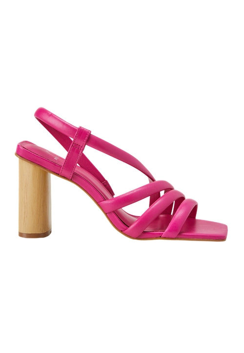 Pink sandal with wooden heel on a white background