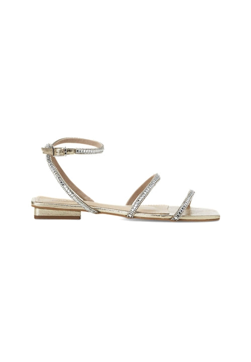 Beige sandal with thin strap and embellishments on a white background