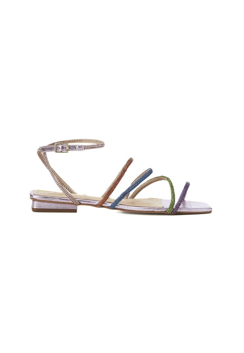 Single sandal with thin straps on a white background