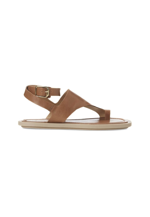 Brown sandal with a single strap on a white background