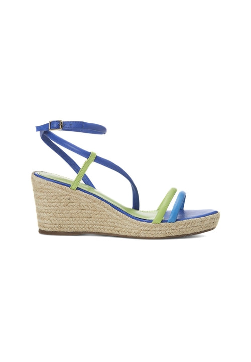 Blue wedge sandal with green straps on a white background