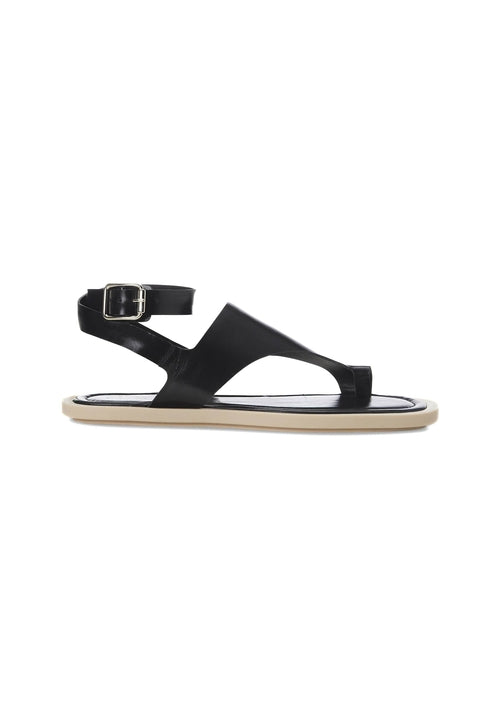 Black sandal with a strap on a white background