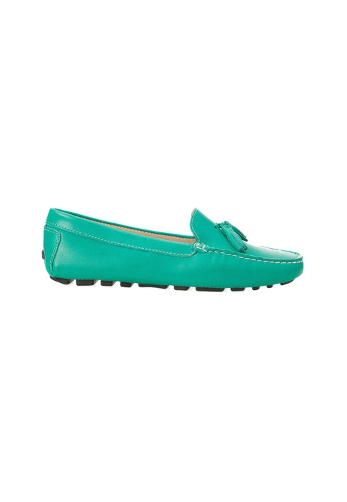 Green loafer shoe on a white background