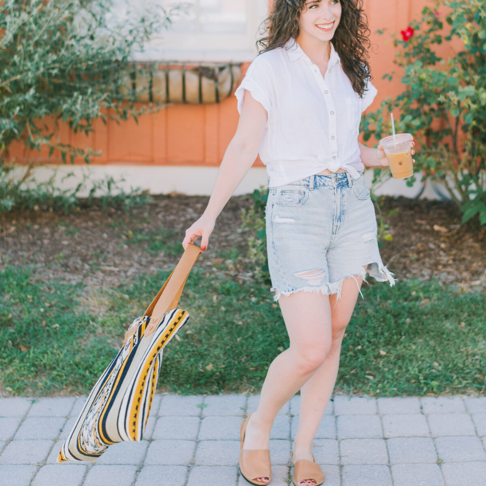Woman wearing beige sandals