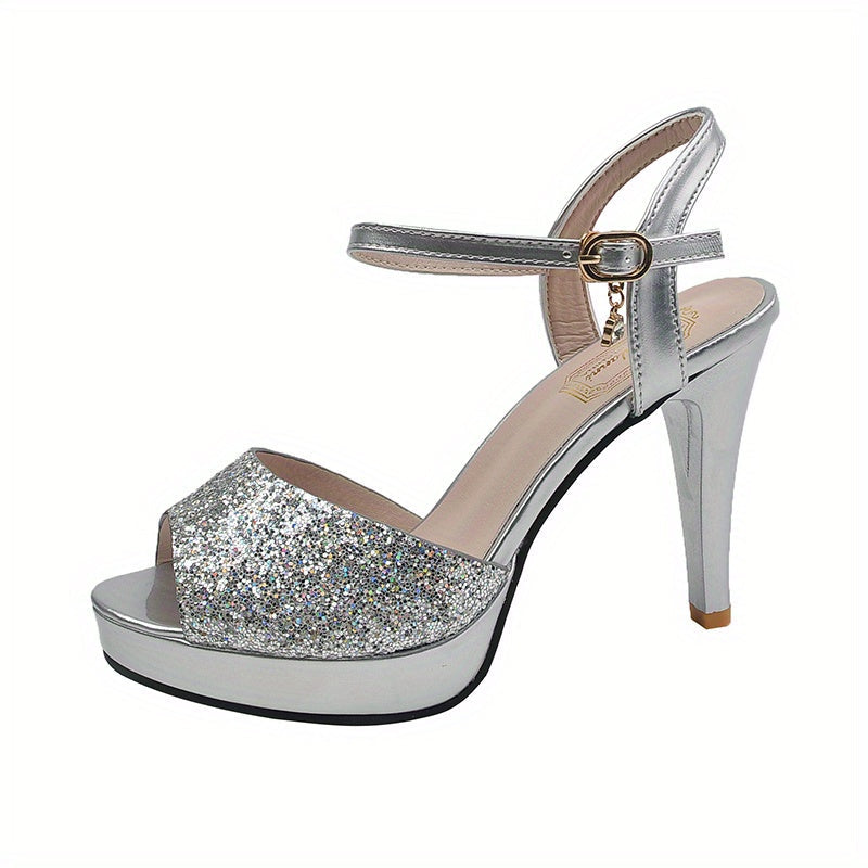 Silver glitter high-heeled sandal on a white background