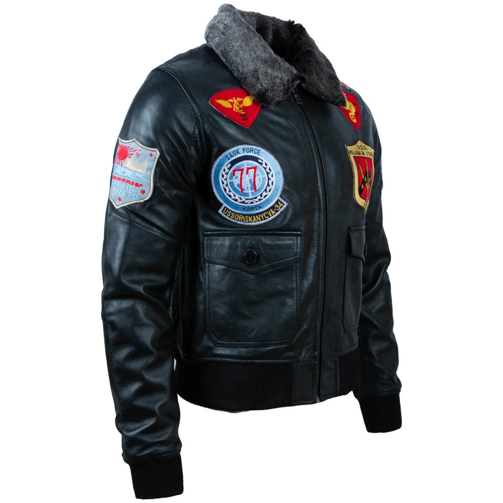Black leather jacket with various patches on a white background