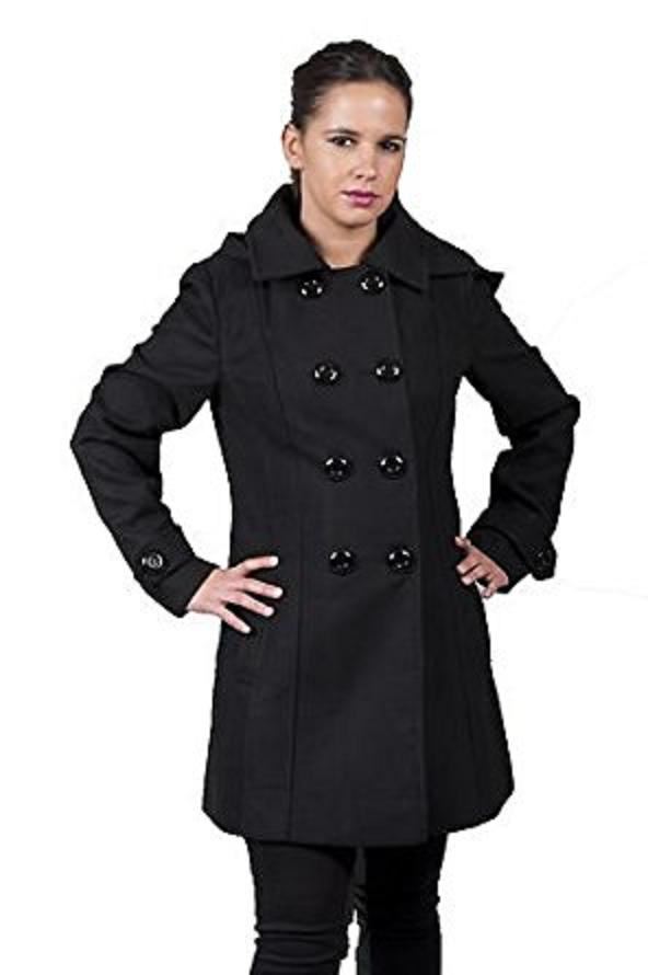 Woman wearing a black coat on a white background