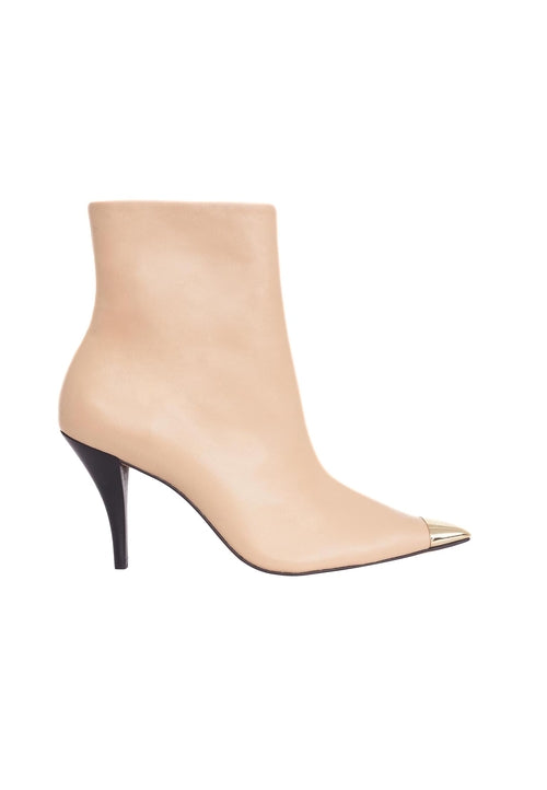 Beige ankle boot with a black heel on a white background