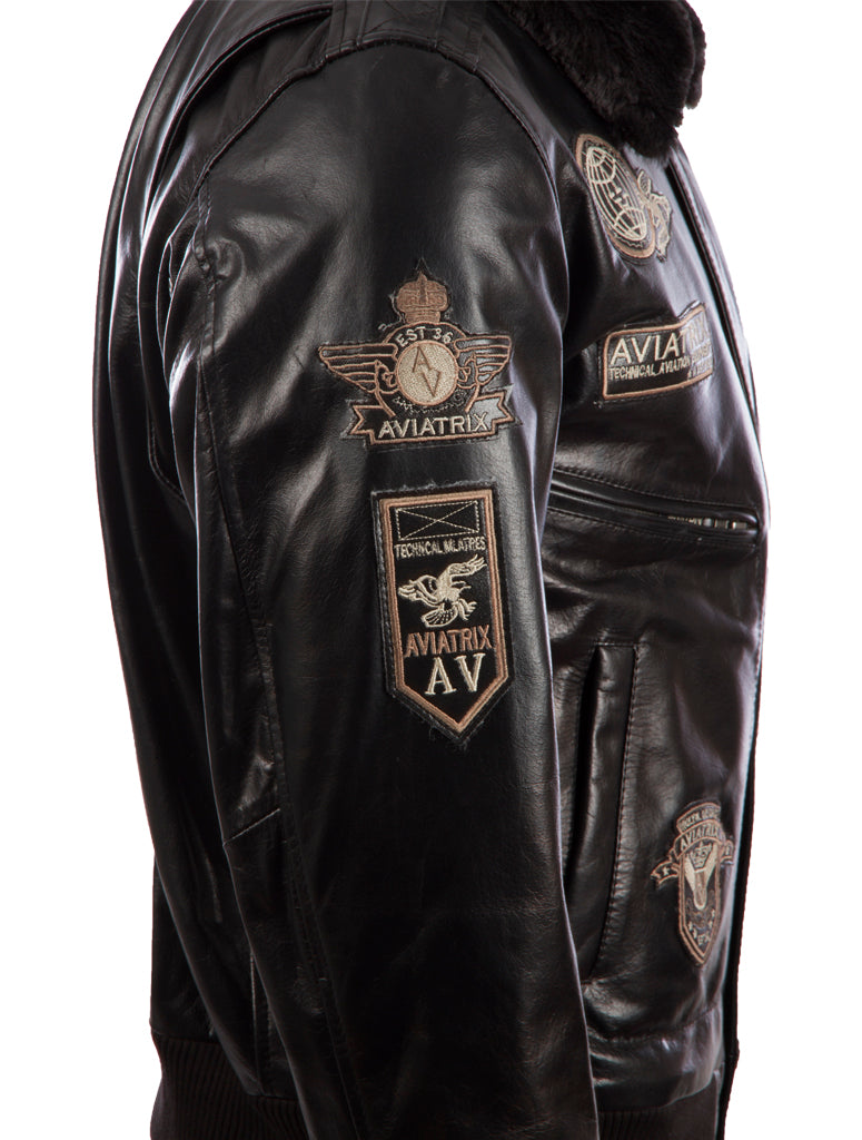 Black leather jacket with Aviatrix patches on a white background right side view