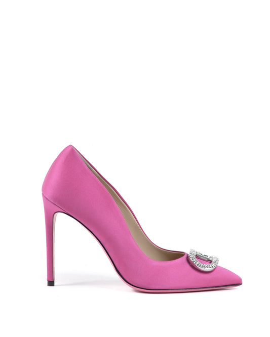 Pink high-heeled shoe with a decorative buckle on a white background