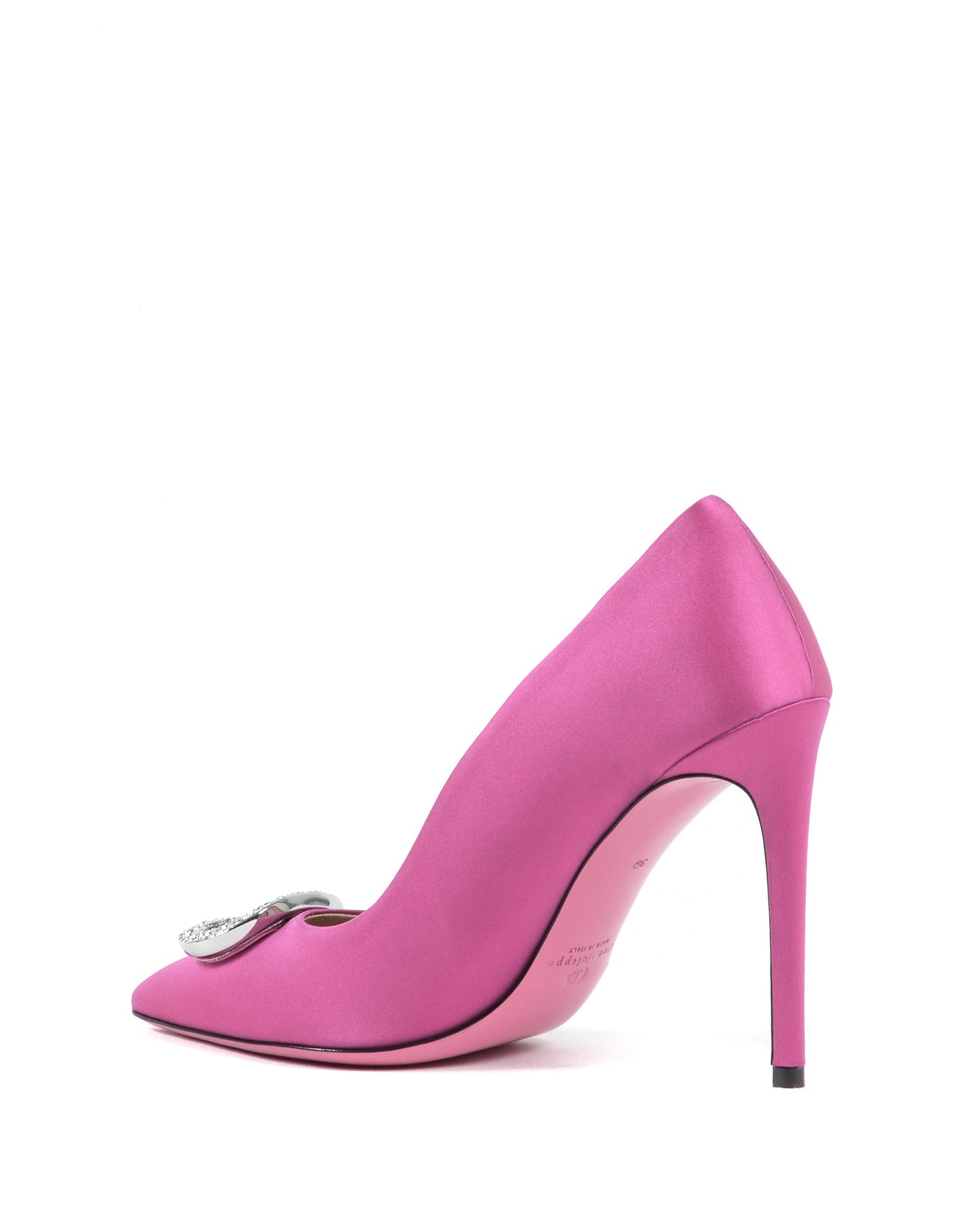 Pink high-heeled shoe with a decorative buckle on a white background
