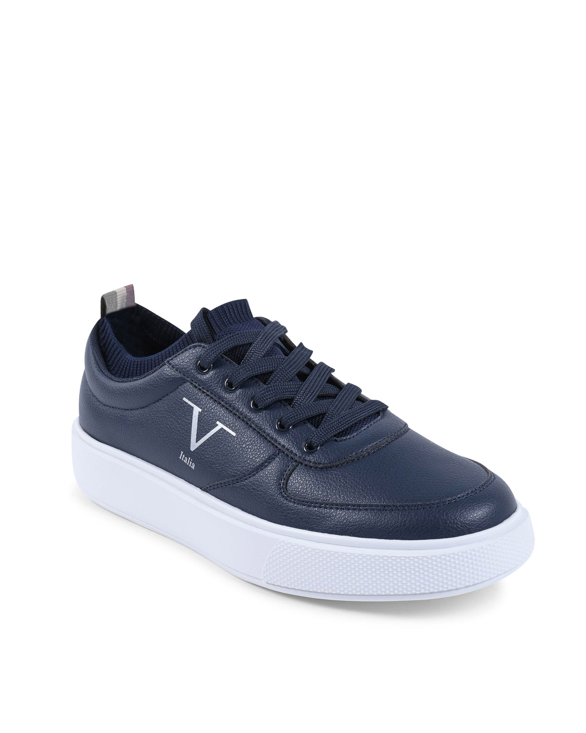 Navy blue sneaker with a white sole on a white background