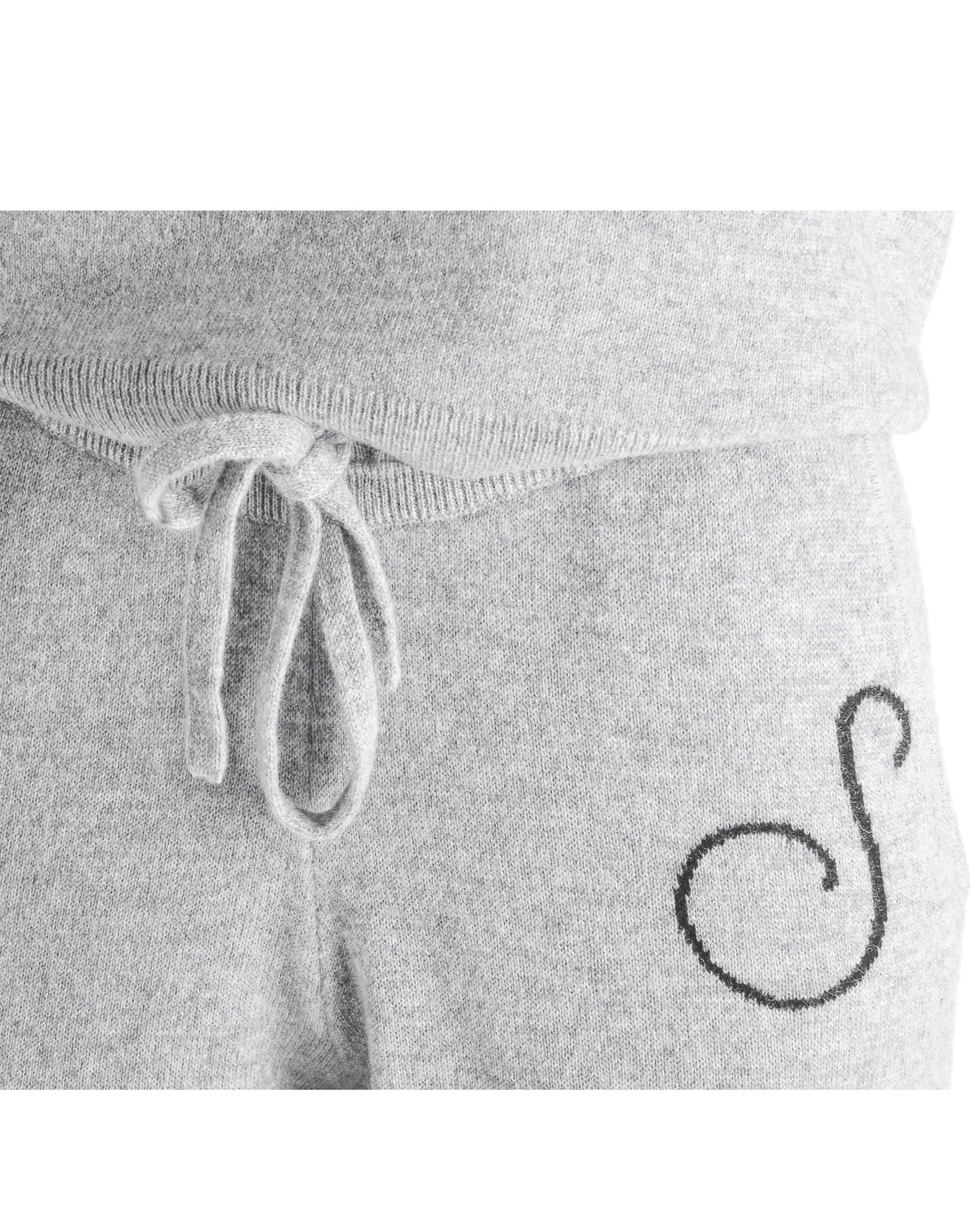 Gray sweatpants with a drawstring and a logo on a white background