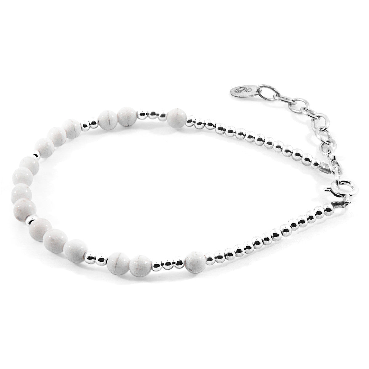 Bracelet with white beads and silver chain on a white background