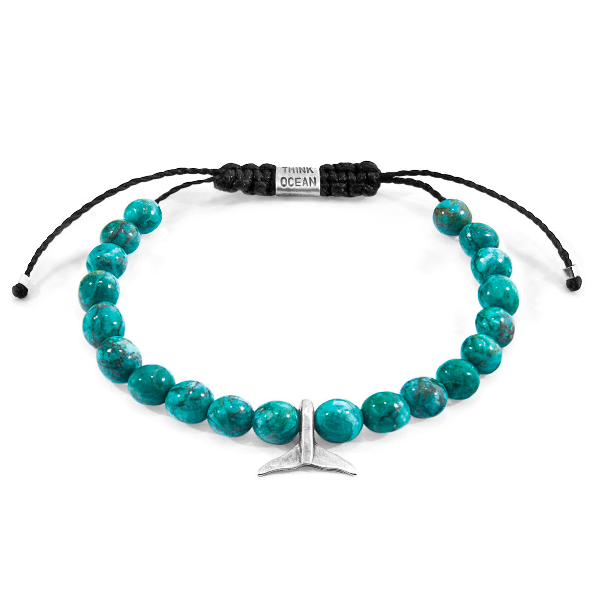 Turquoise beaded bracelet with a silver fish charm on a white background