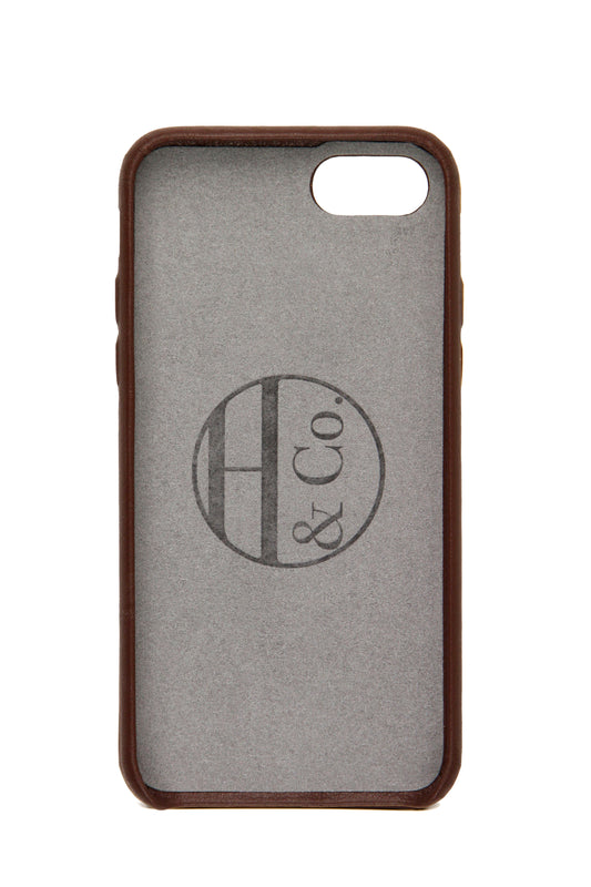 Phone case with 'H & Co' monogram on a gray background