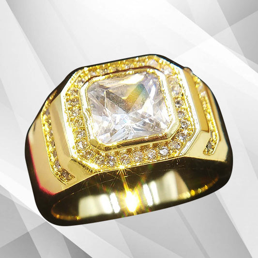 Gold ring with a large diamond on a gray geometric background