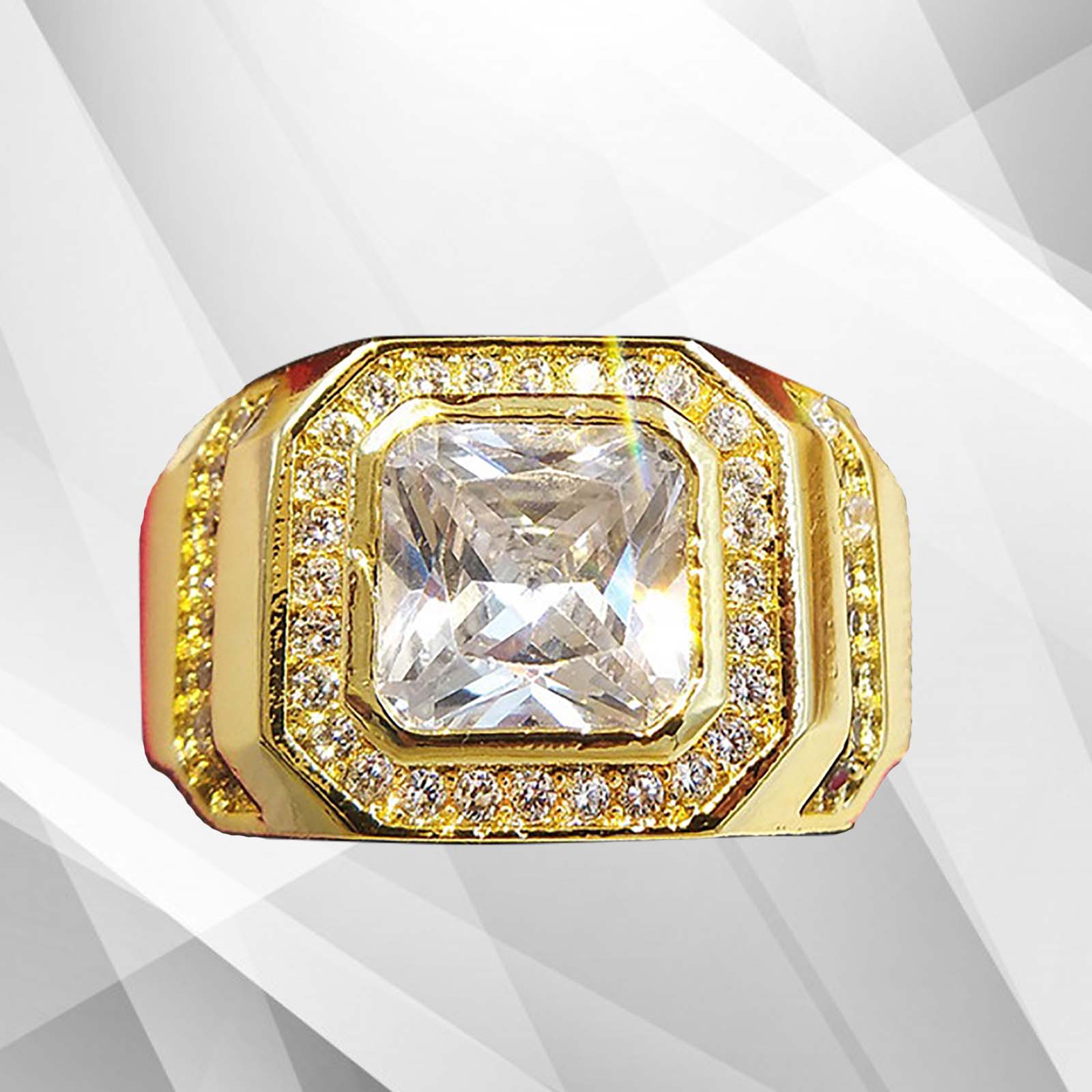 Gold ring with a large diamond and smaller diamonds on a white background