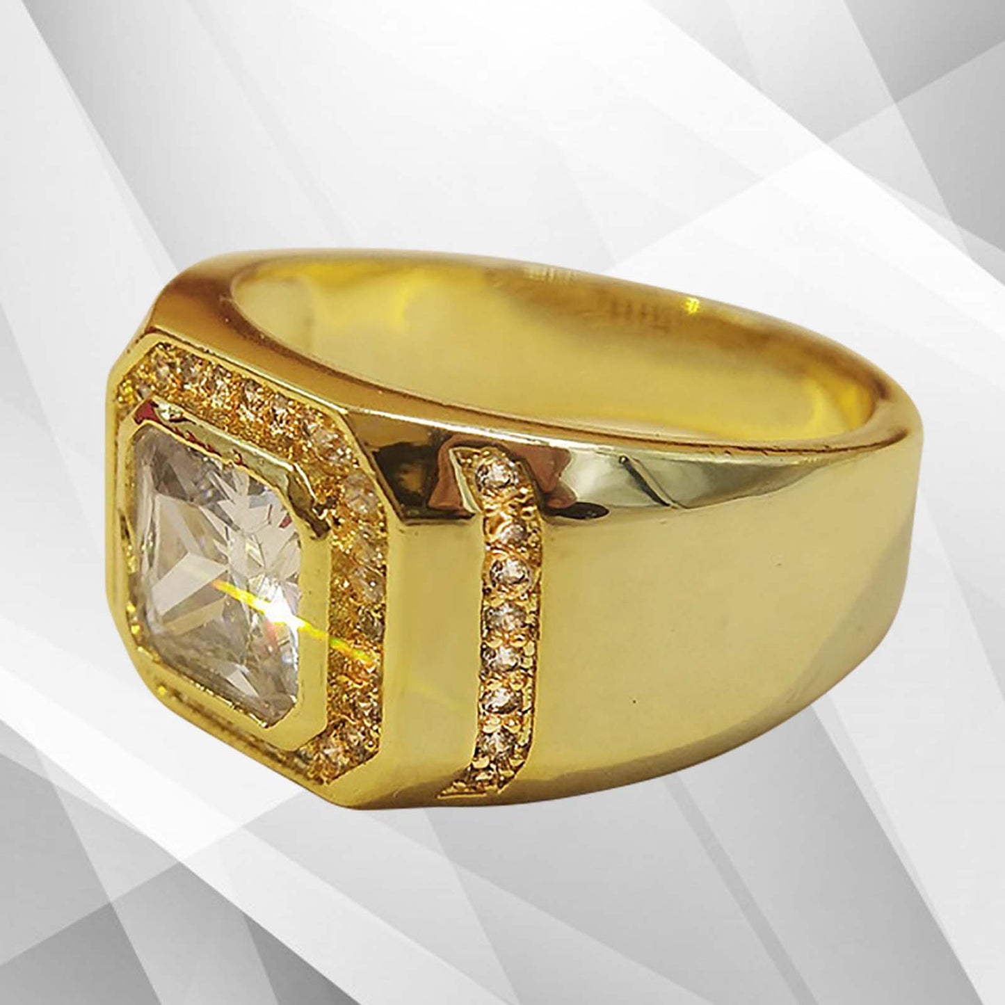 Gold ring with a large diamond and smaller stones on a geometric patterned background