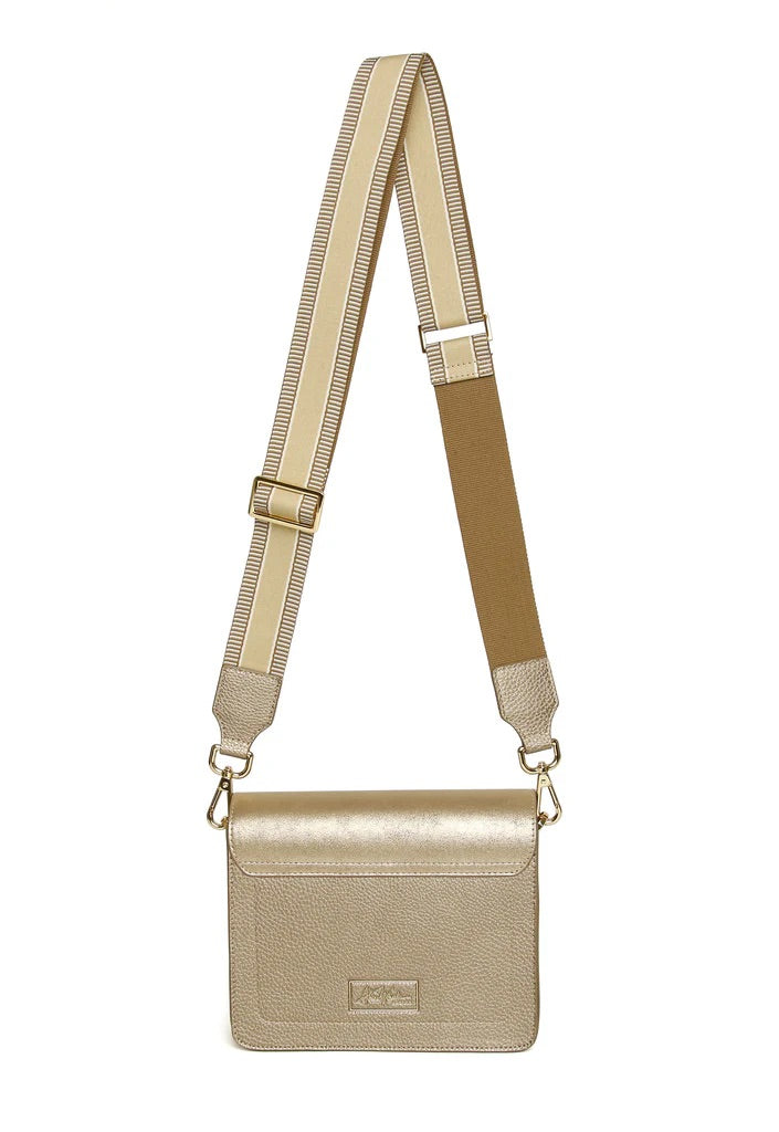 Gold crossbody bag with a beige strap on a white background