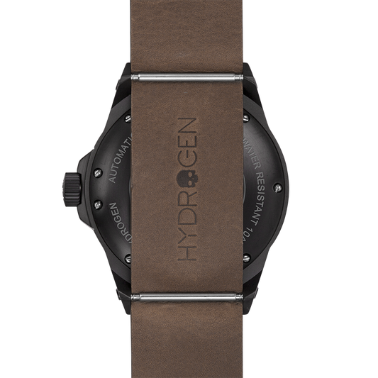 Watch with brown strap and black case on a white background