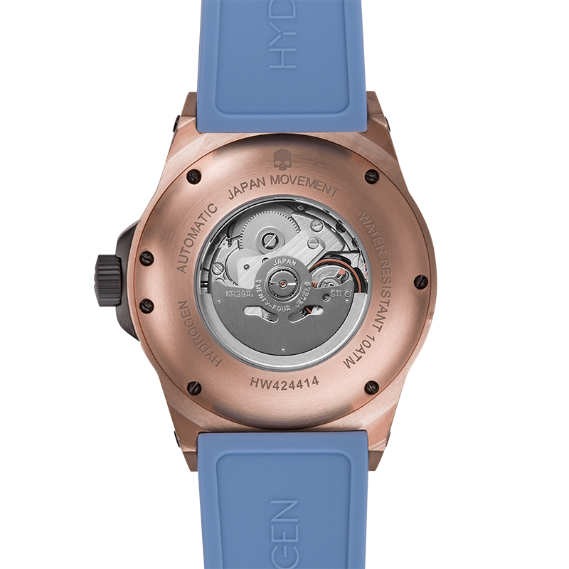 Watch with blue strap and rose gold case on a white background
