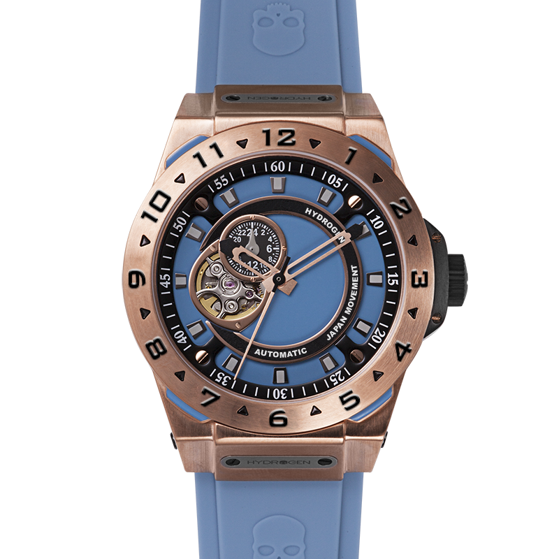Watch with blue strap and rose gold case on a white background