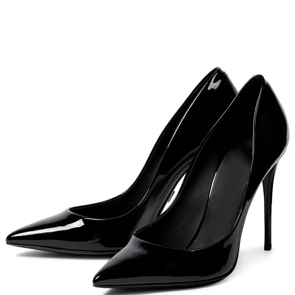 Pair of black high-heeled shoes on a white background
