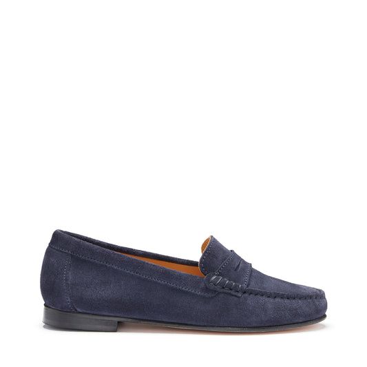 Navy blue suede loafer on a white background