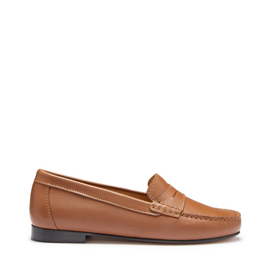 Brown leather loafer on a white background