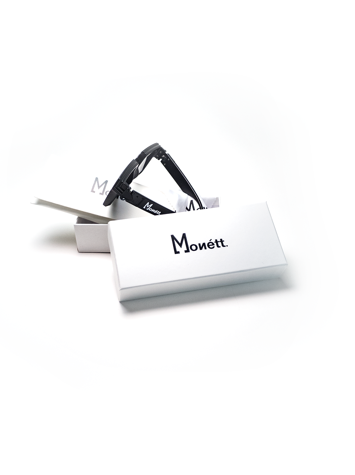 Eyeglasses with a white case on a white background, featuring the brand 'Mouett'.