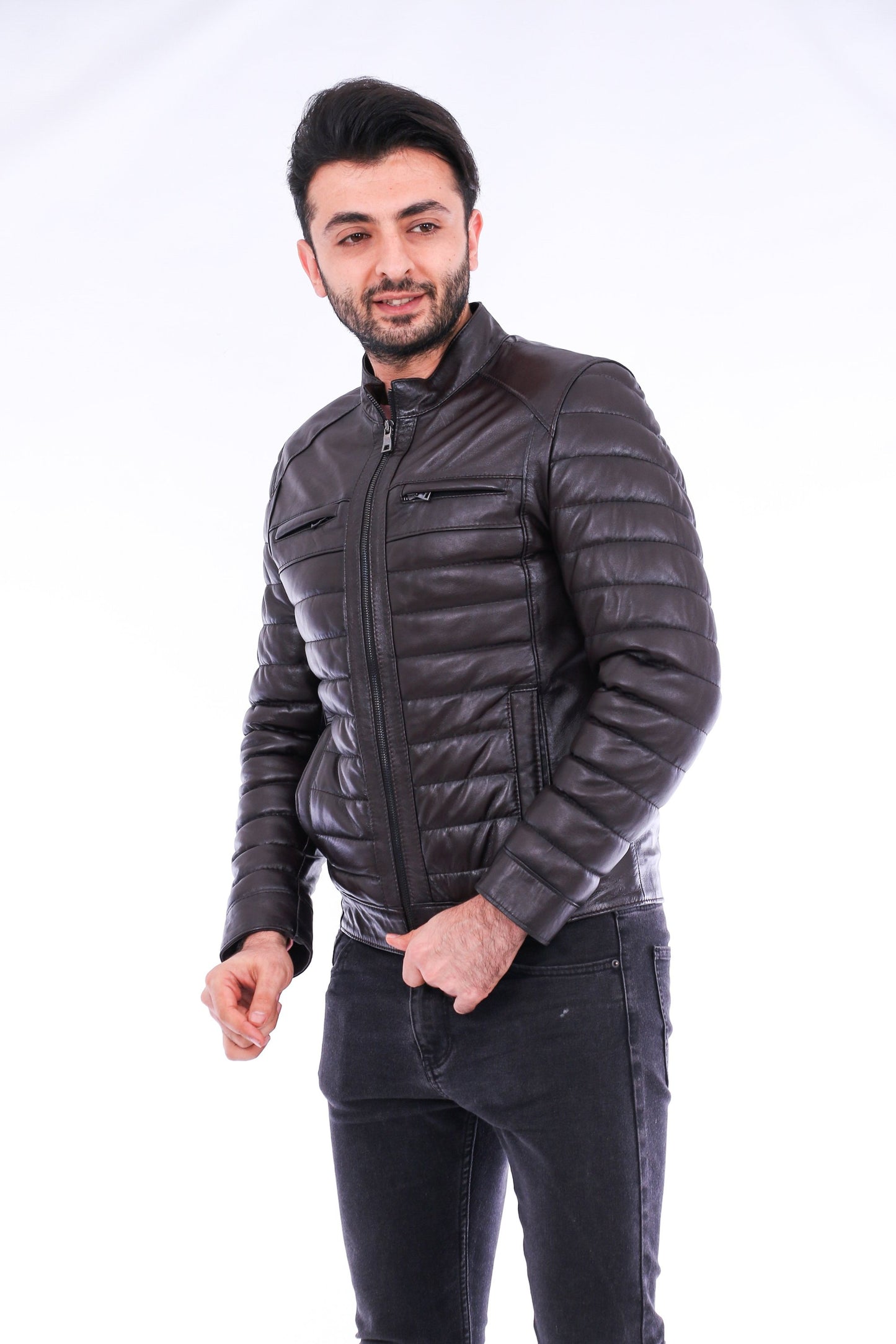 Man wearing a black puffer jacket on a white background