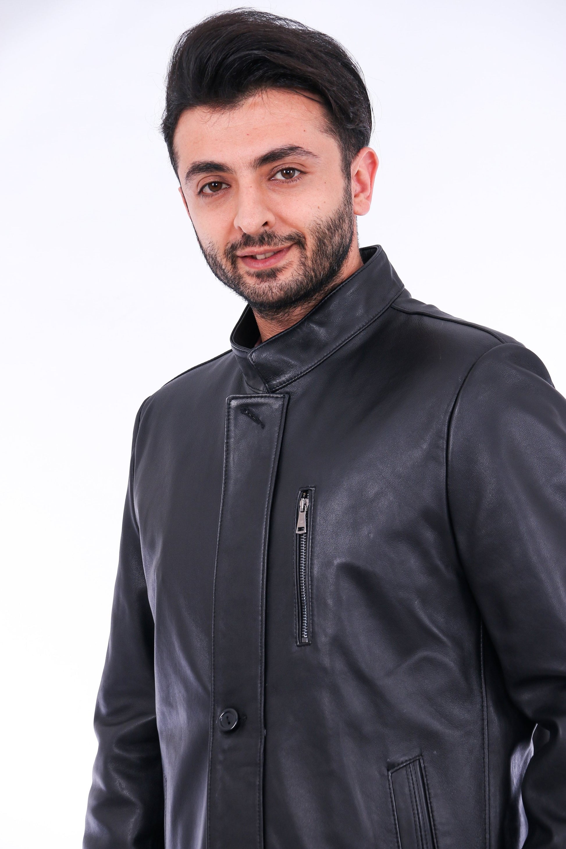 Man wearing a black leather jacket on a white background