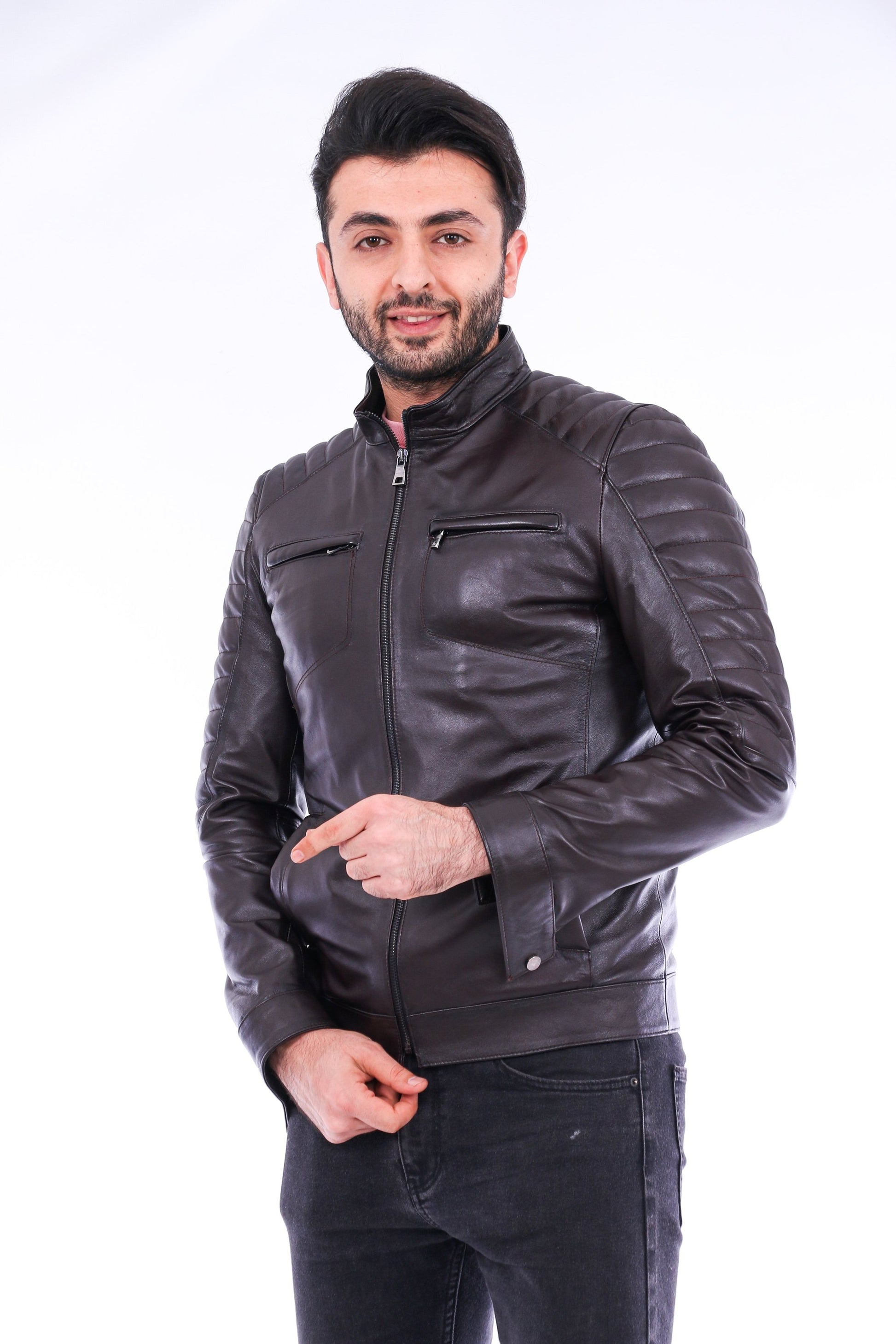 Man wearing a black leather jacket on a white background