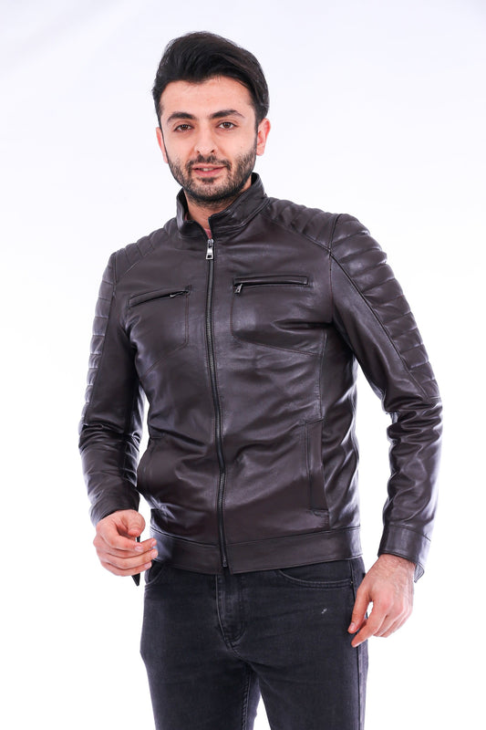 Man wearing a dark leather jacket on a white background