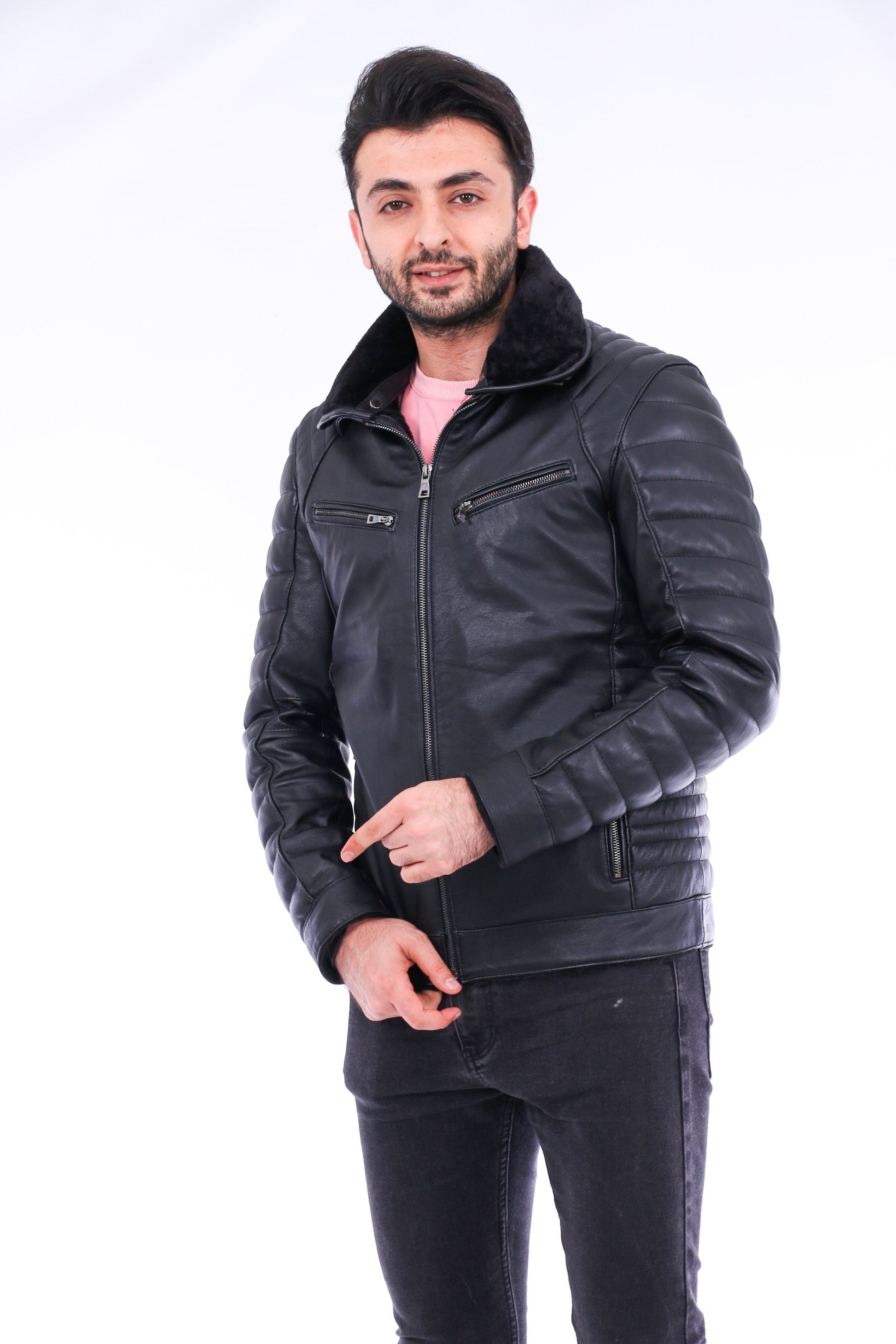 Man wearing a black leather jacket on a white background
