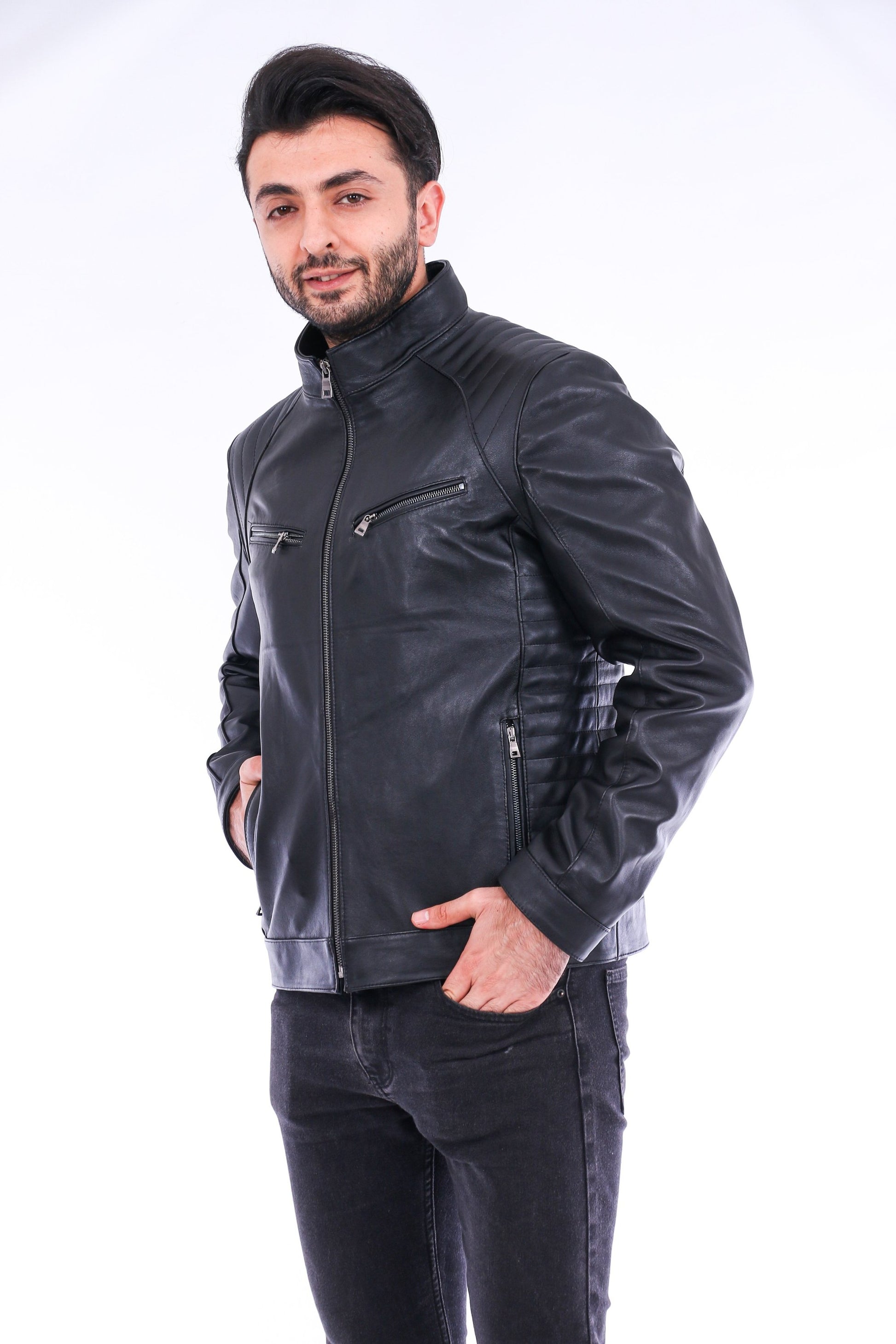 Man wearing a black leather jacket on a white background