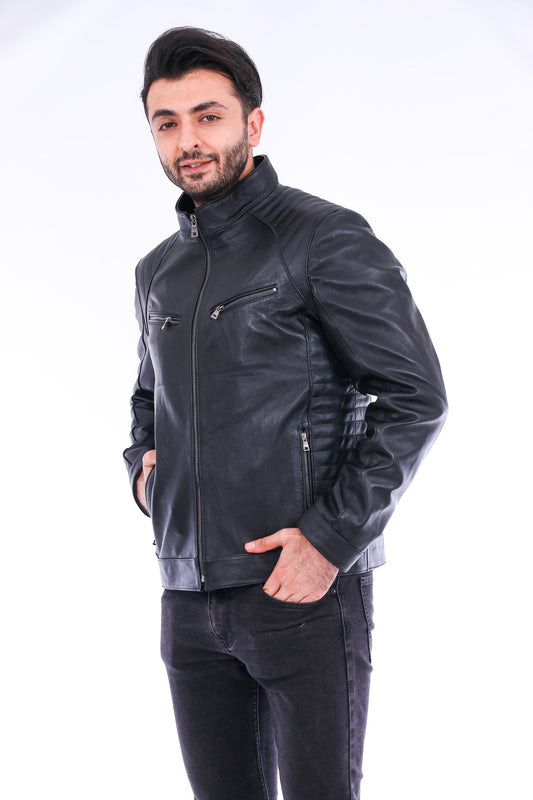Man wearing a black leather jacket on a white background