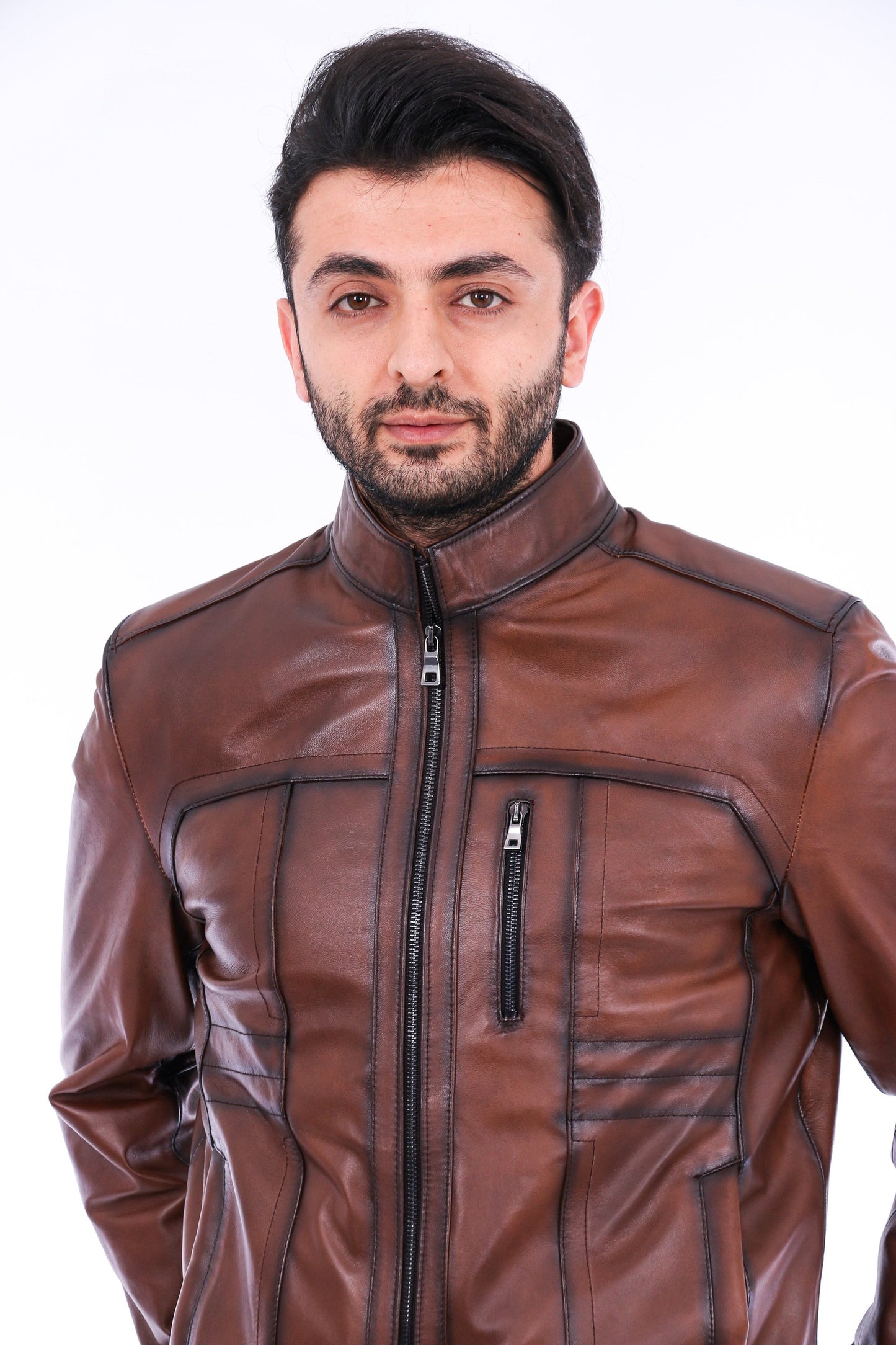 Man wearing a brown leather jacket on a white background