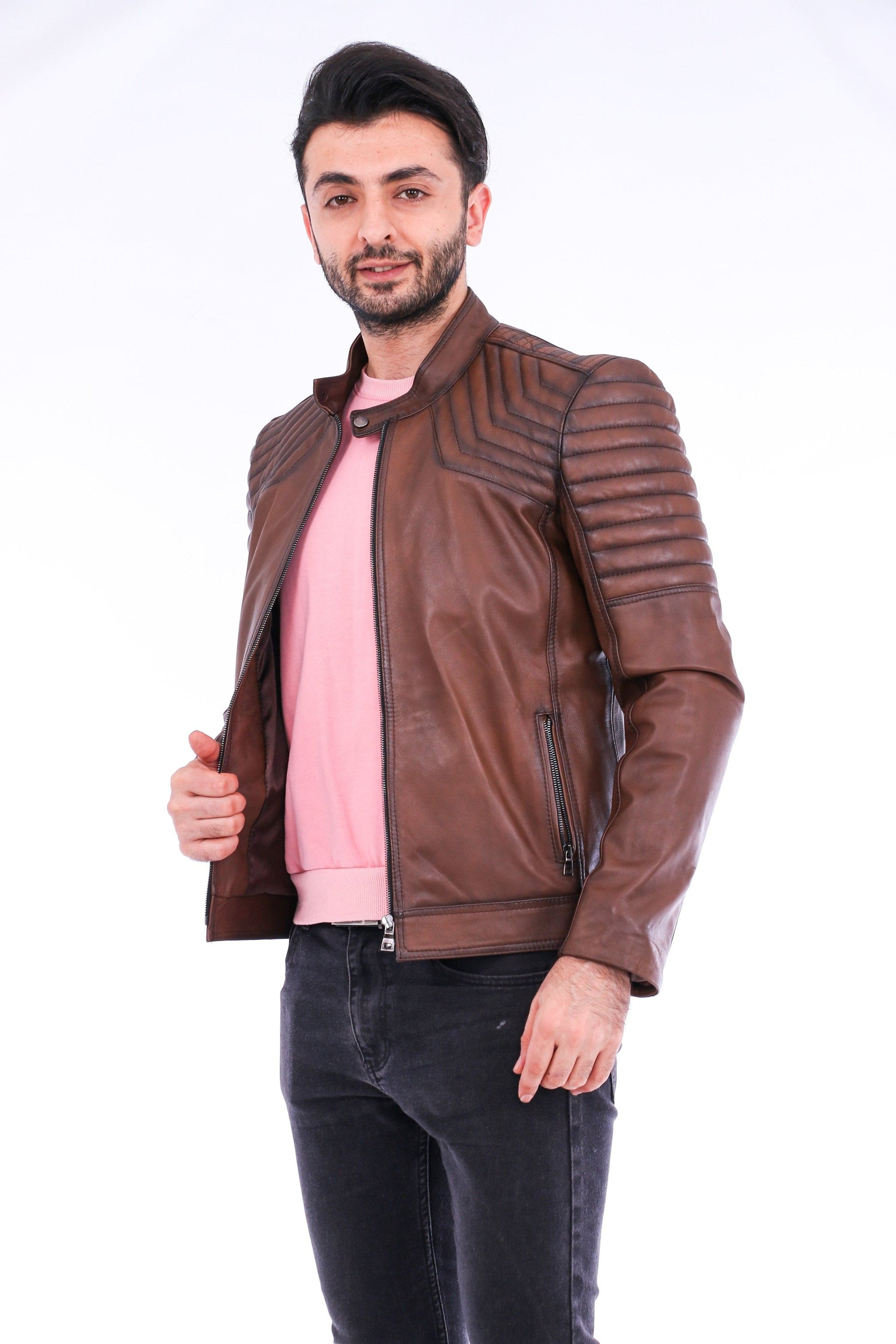 Man wearing a brown leather jacket on a white background