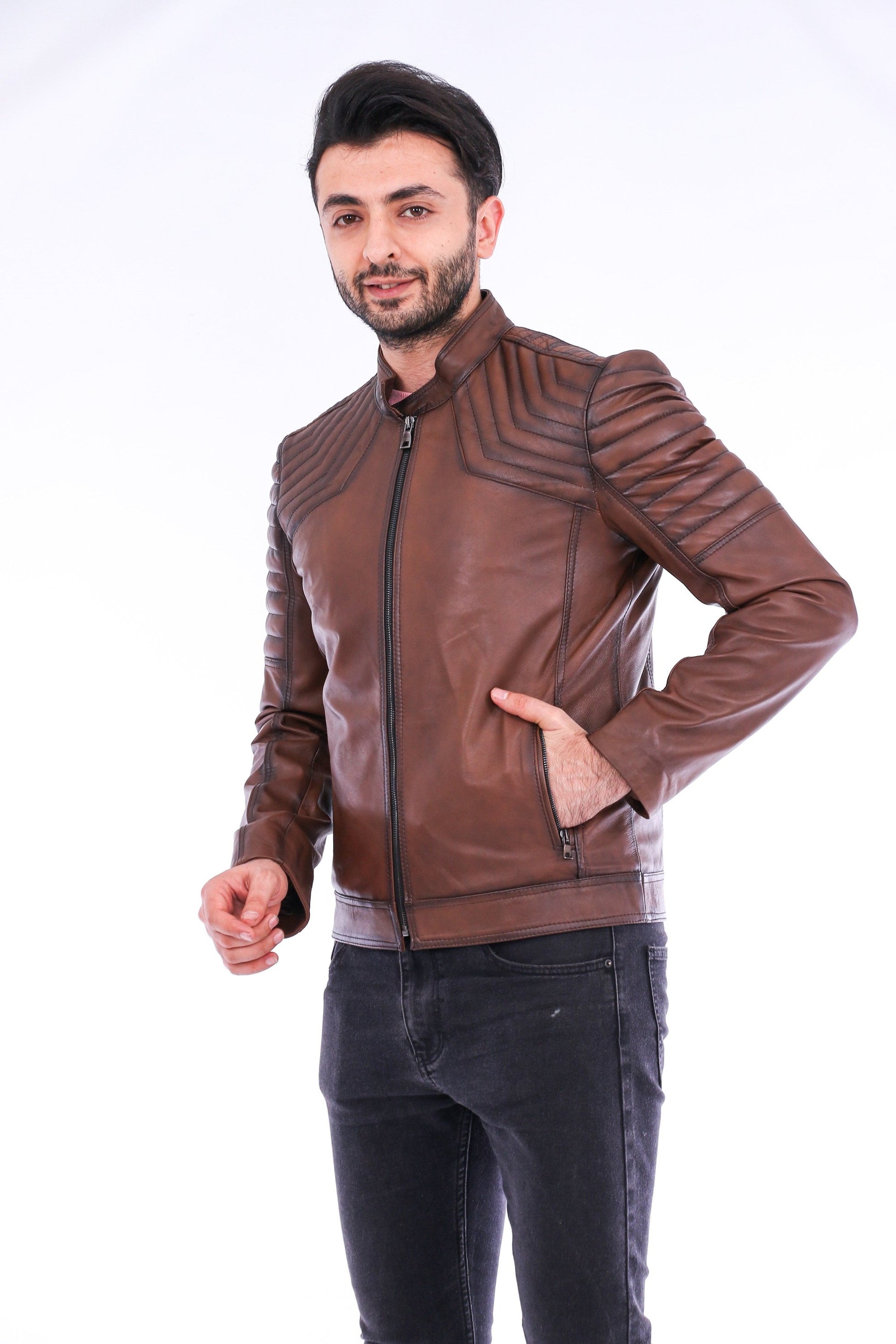 Man wearing a brown leather jacket on a white background