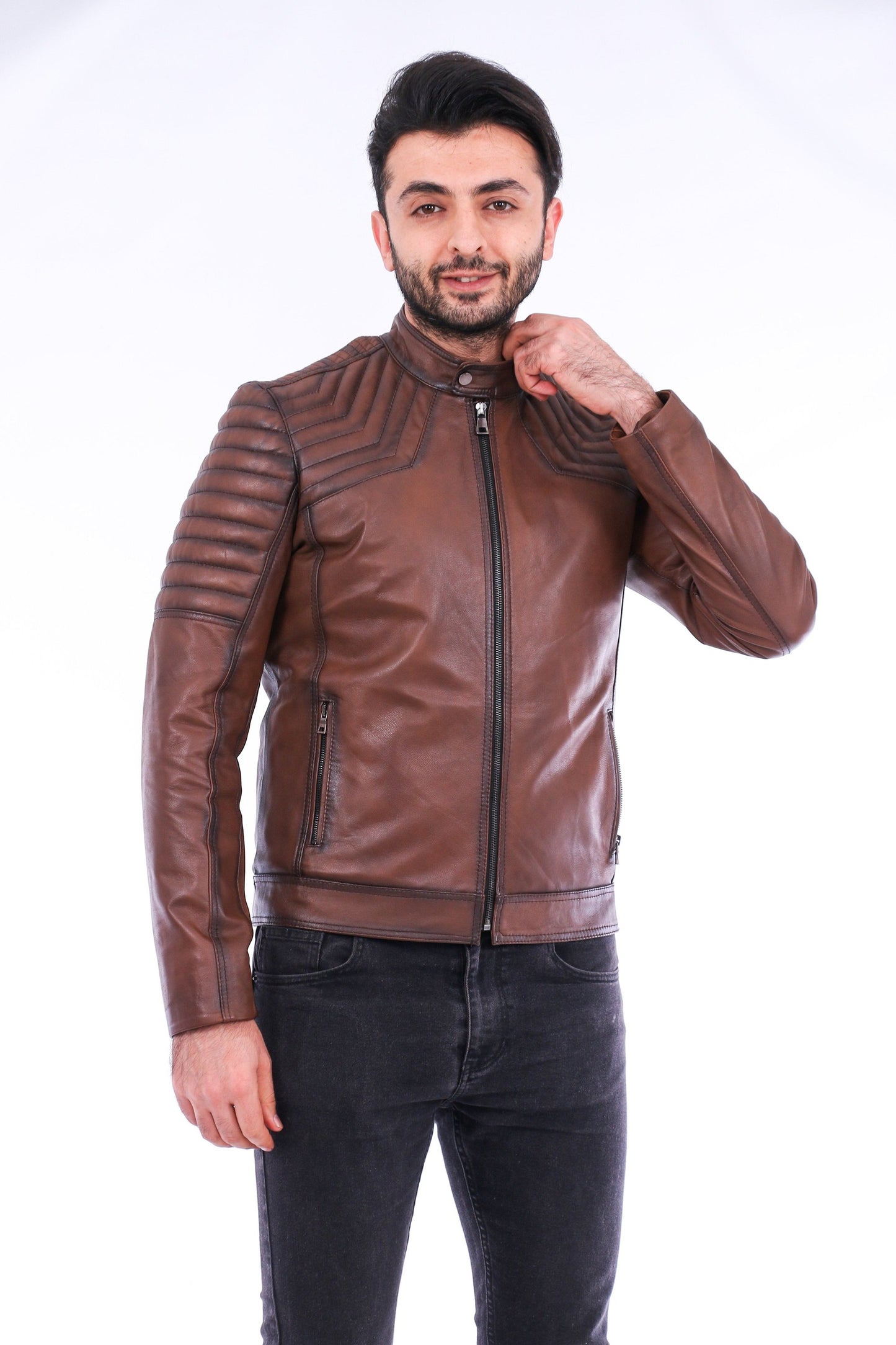 Man wearing a brown leather jacket on a white background