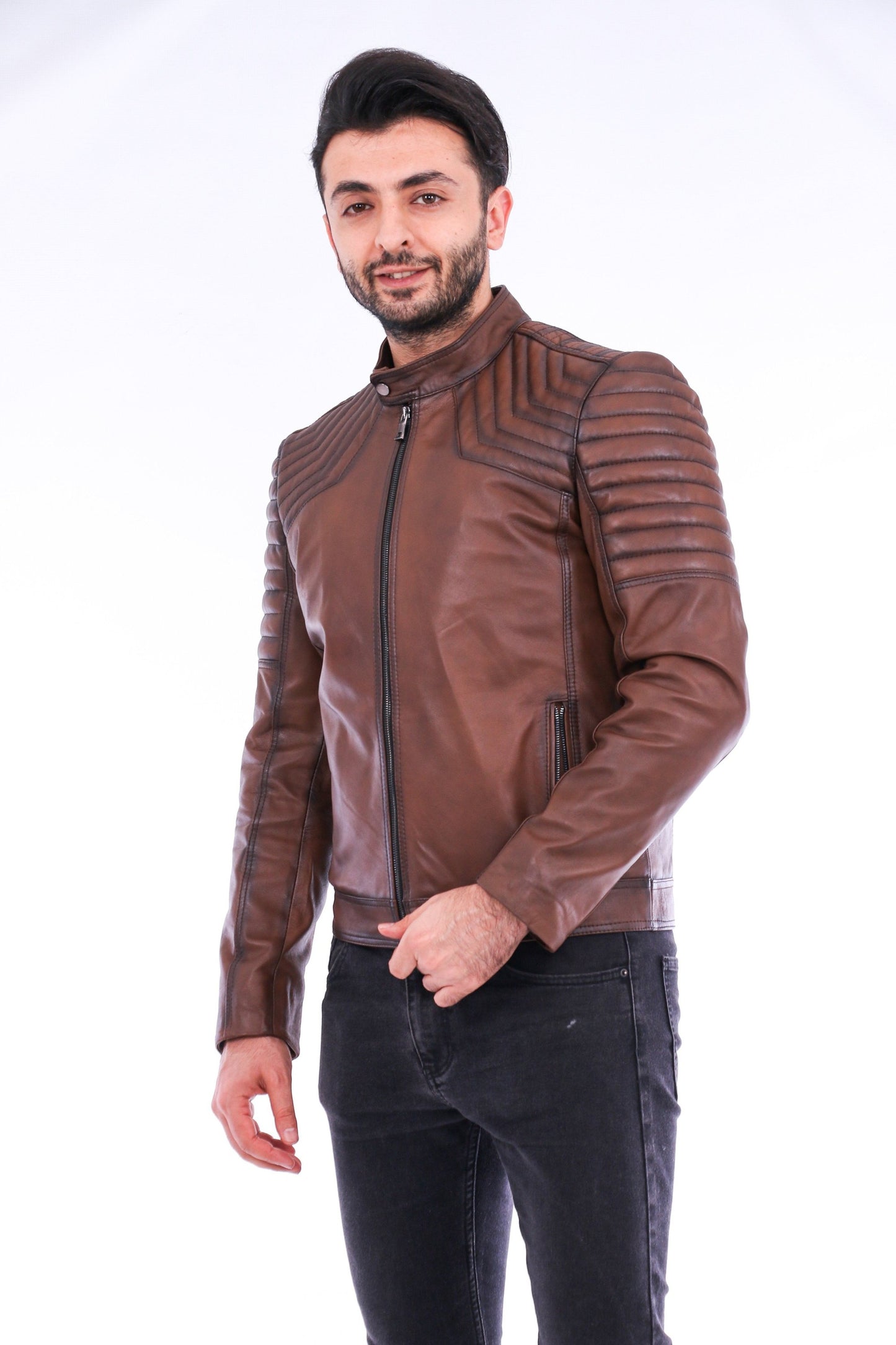 Man wearing a brown leather jacket on a white background