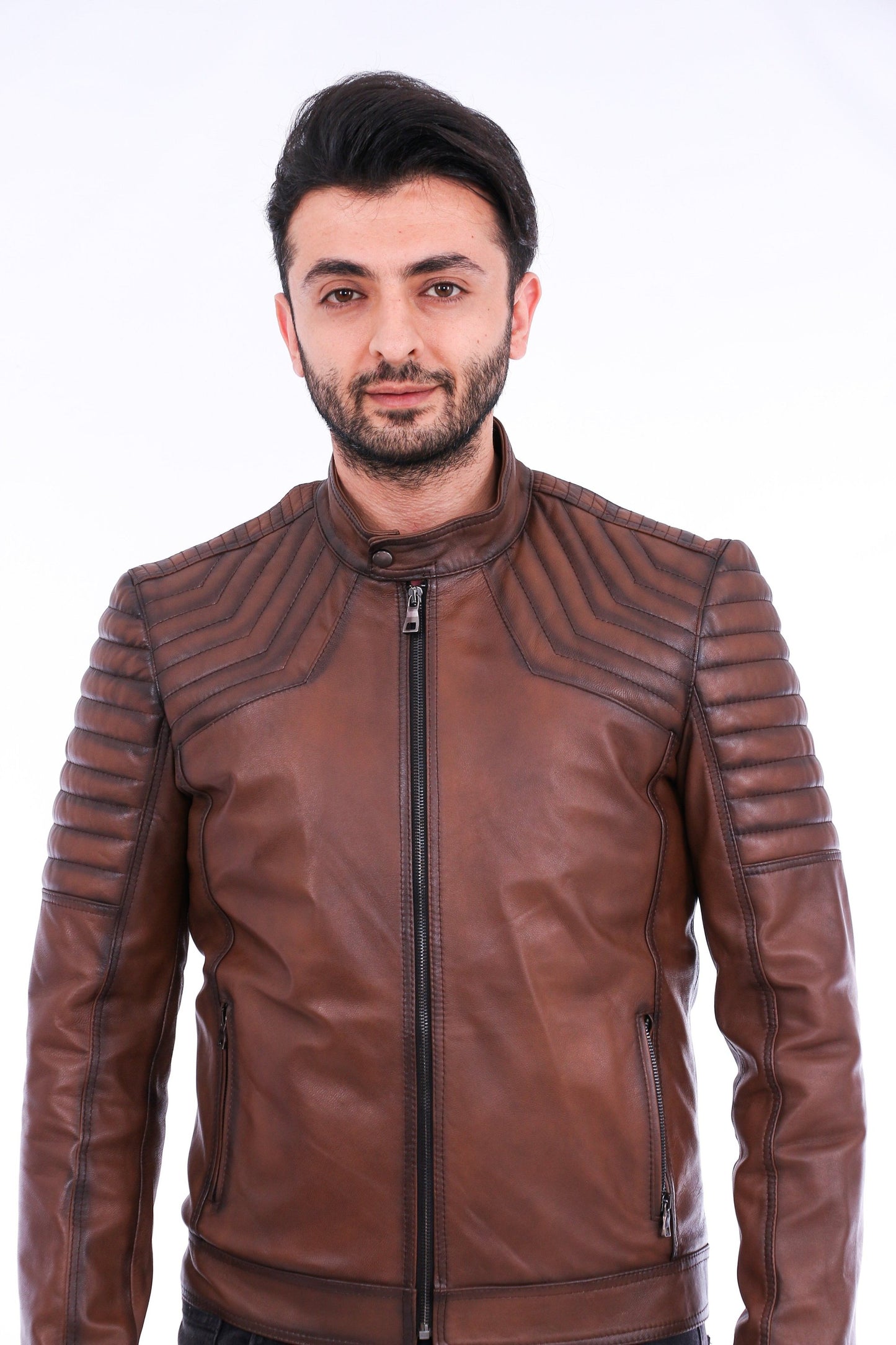 Man wearing a brown leather jacket on a white background