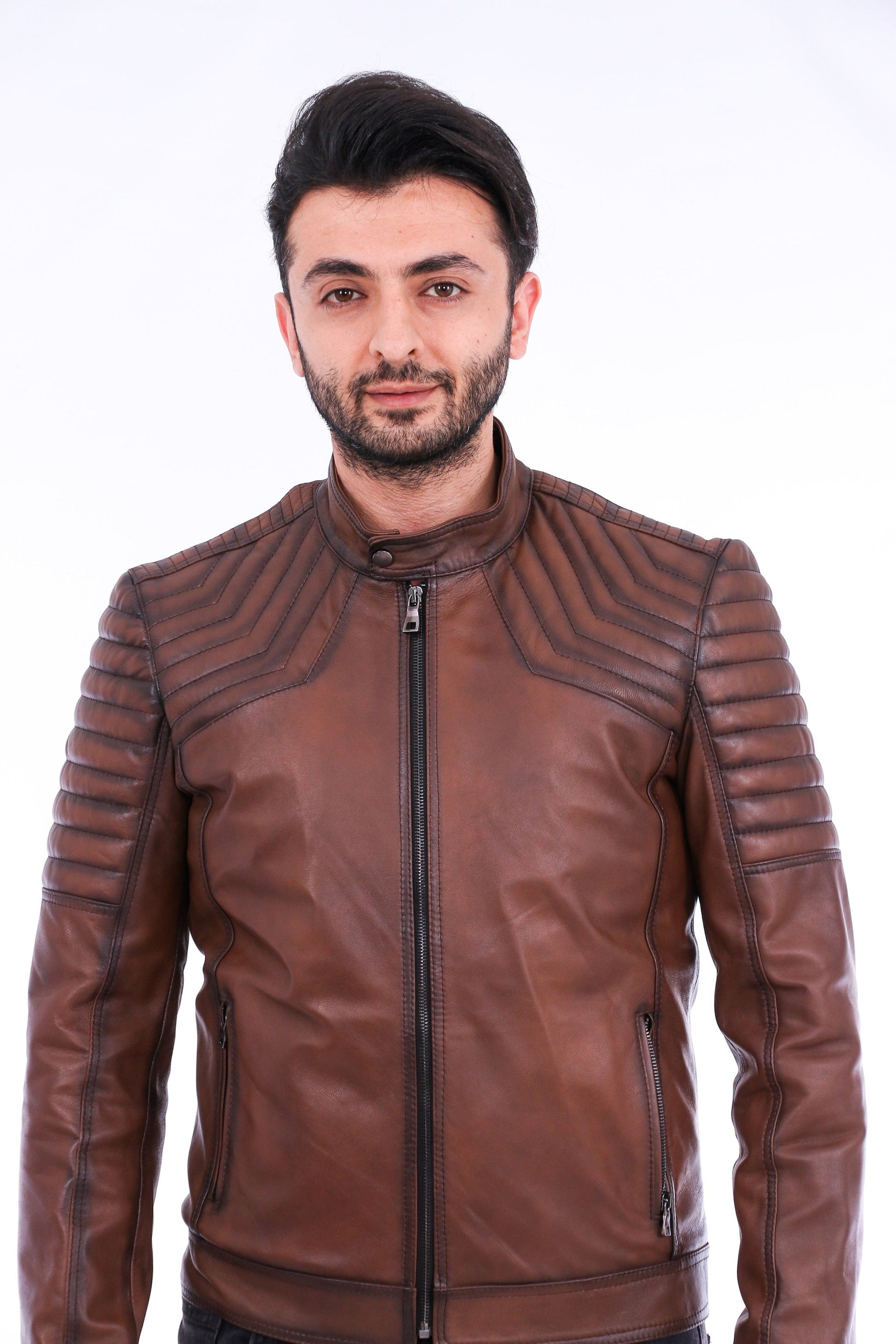 Man wearing a brown leather jacket on a white background
