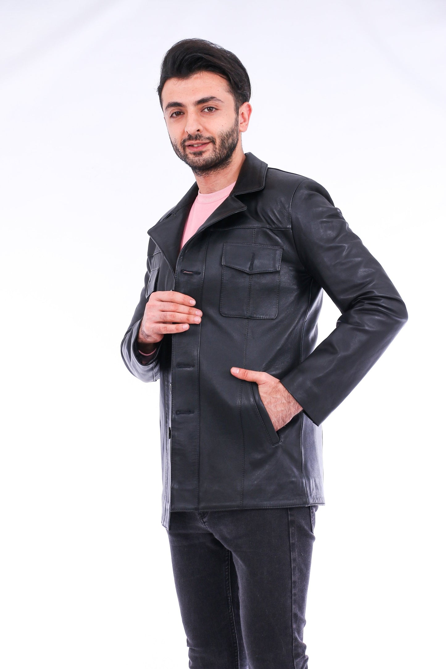 Man wearing a black leather jacket on a white background