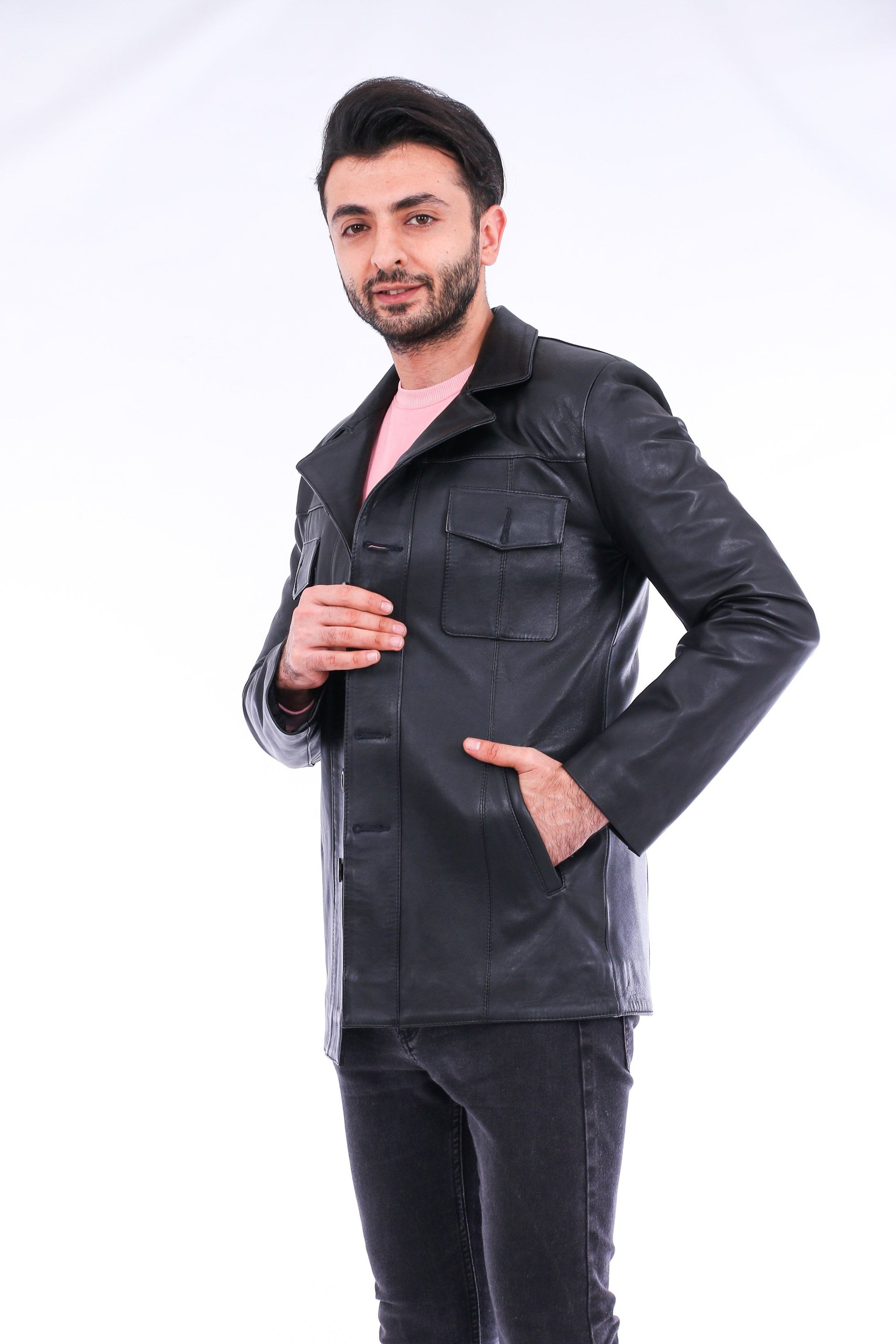 Man wearing a black leather jacket on a white background