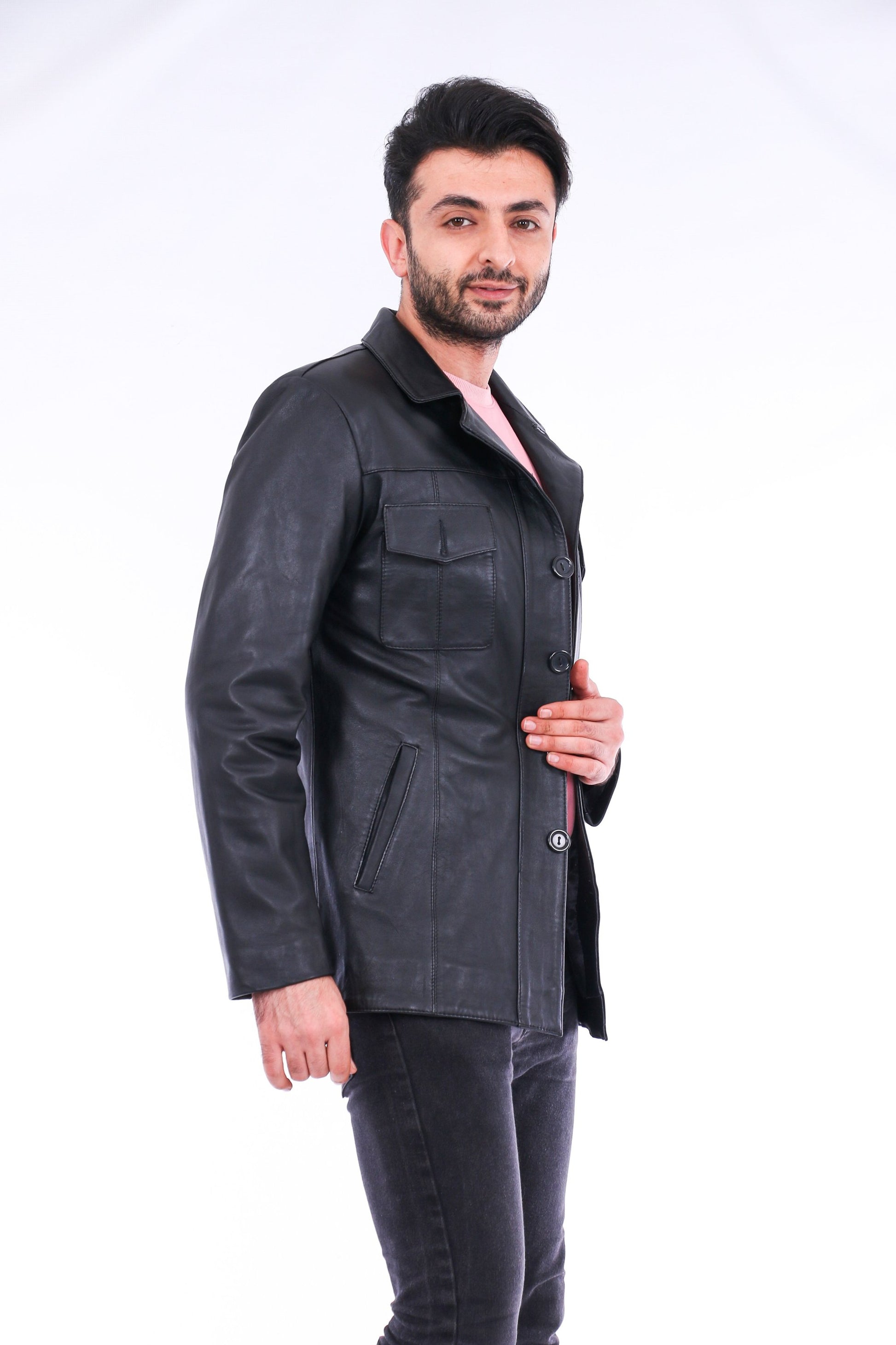 Man wearing a black leather jacket on a white background