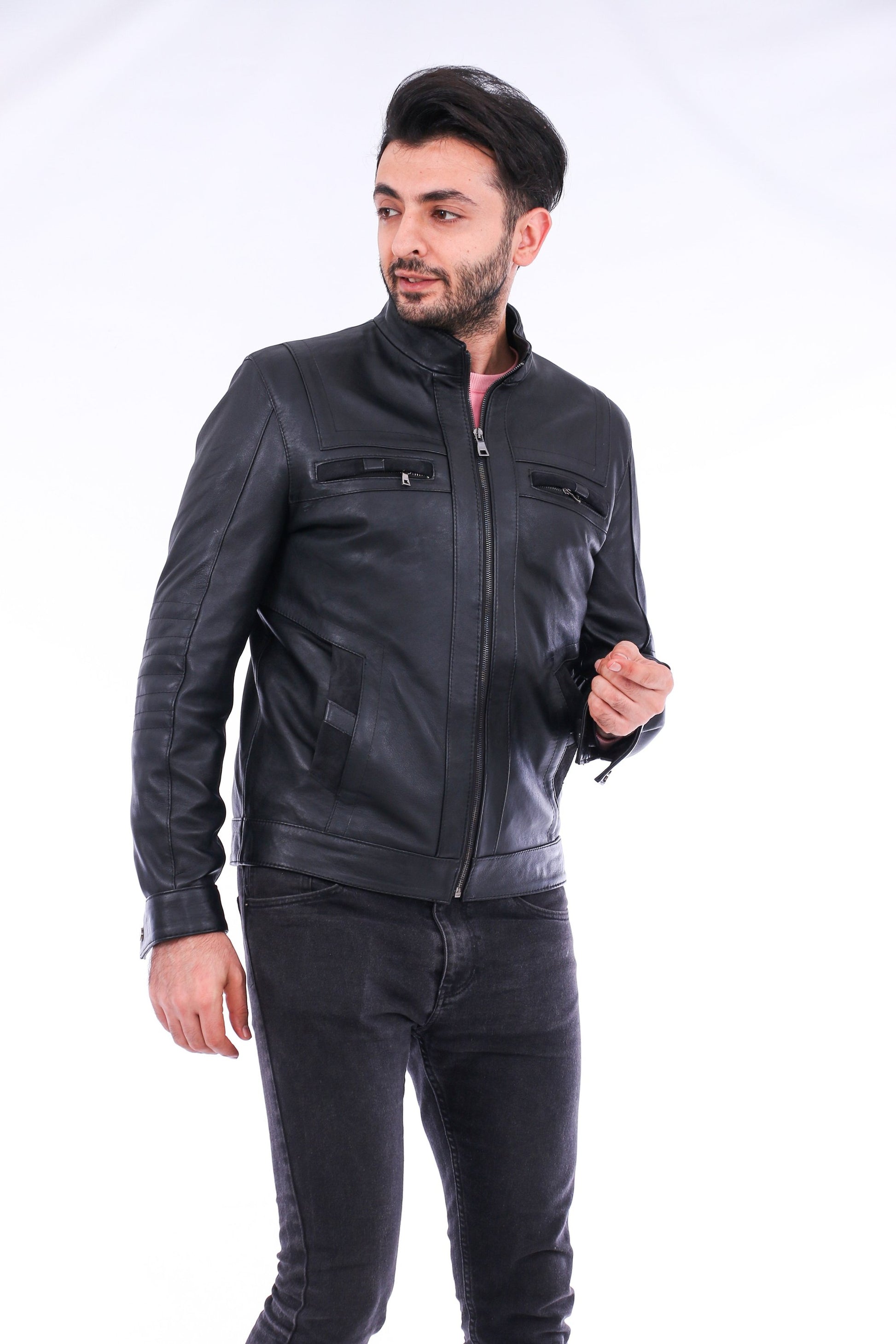 Man wearing a black leather jacket on a white background