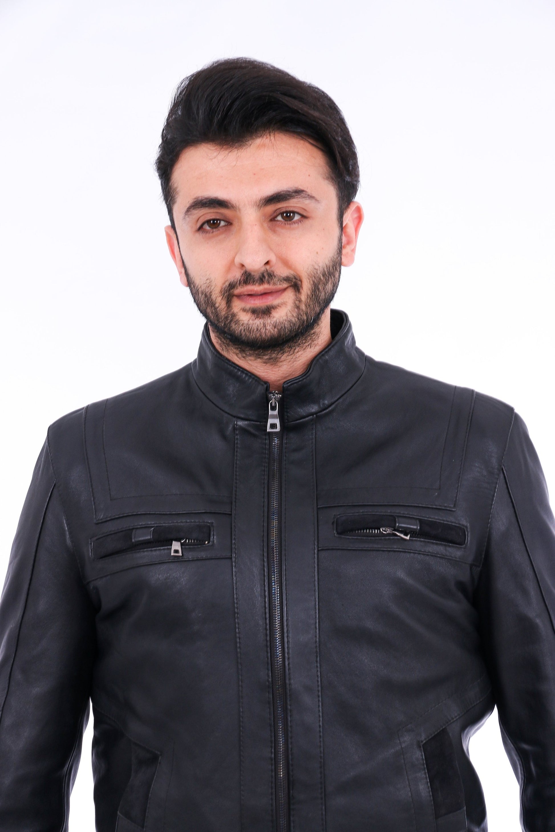Man wearing a black leather jacket on a white background